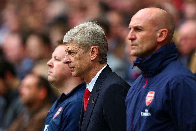 LONDON, ENGLAND - APRIL 12:  Arsene Wenger of Arsenal observes a minute's silence to mark the 25th anniversary of theHillsborough disaster prior to the FA Cup Semi-Final match between Wigan Athletic and Arsenal at Wembley Stadium on April 12, 2014 in London, England.  (Photo by Michael Steele/Getty Images)