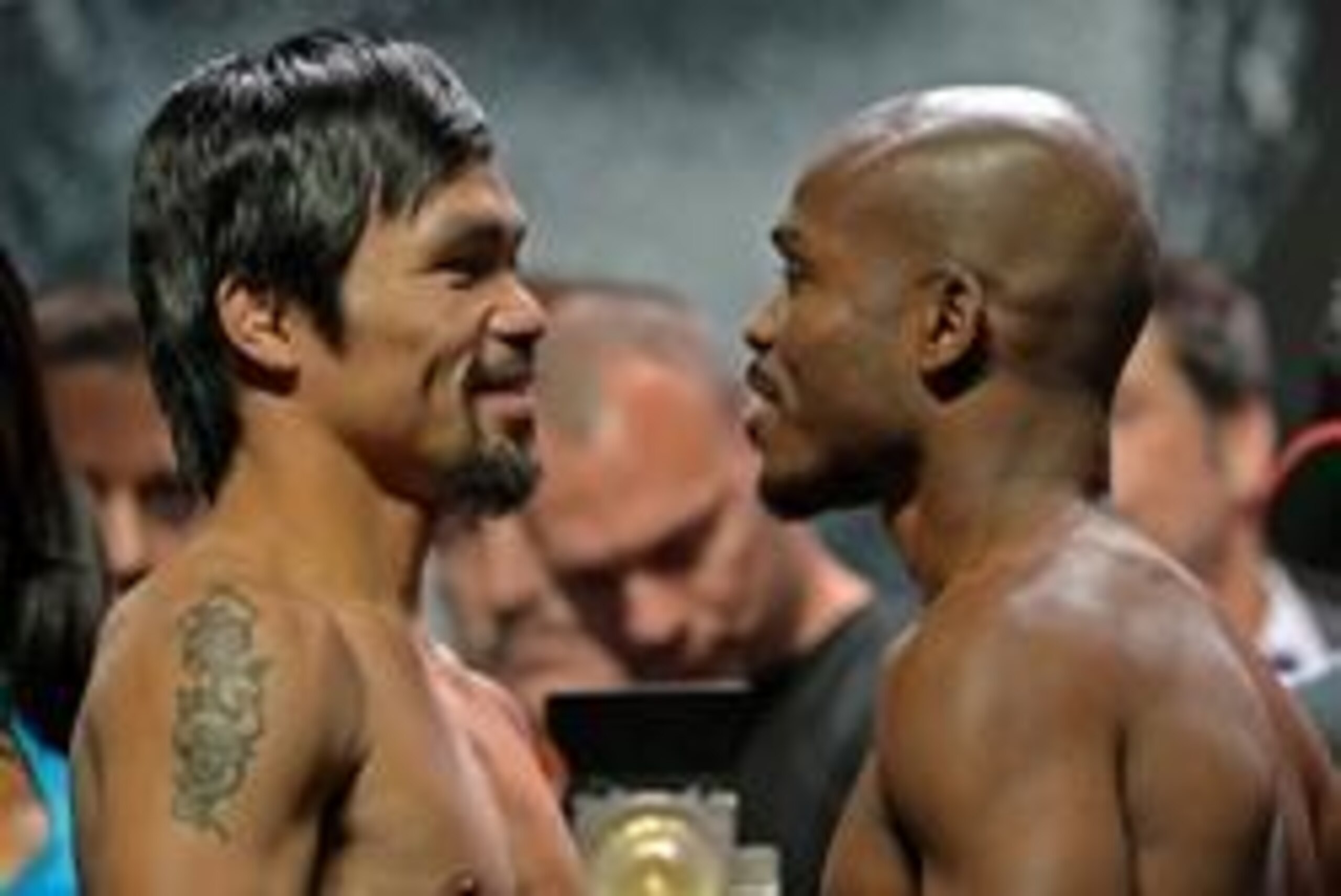 Apr 11, 2014; Las Vegas, NV, USA; Manny Pacquiao and Timothy Bradley Jr. face off at the weigh in for their rematch for the WBO welterweight title on Saturday, April 12 at MGM Grand Garden Arena. Mandatory Credit: Jayne Kamin-Oncea-USA TODAY Sports