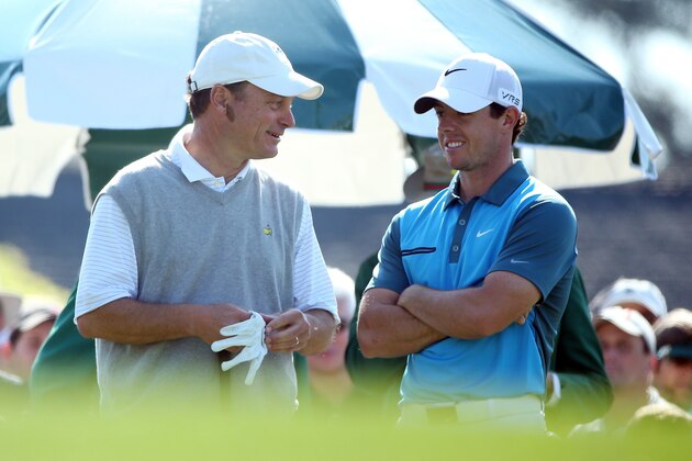 AUGUSTA, GA - APRIL 12:  Rory McIlroy of Northern Ireland chats with marker Jeff Knox on the first tee box during the third round of the 2014 Masters Tournament at Augusta National Golf Club on April 12, 2014 in Augusta, Georgia.  (Photo by Andrew Redington/Getty Images)
