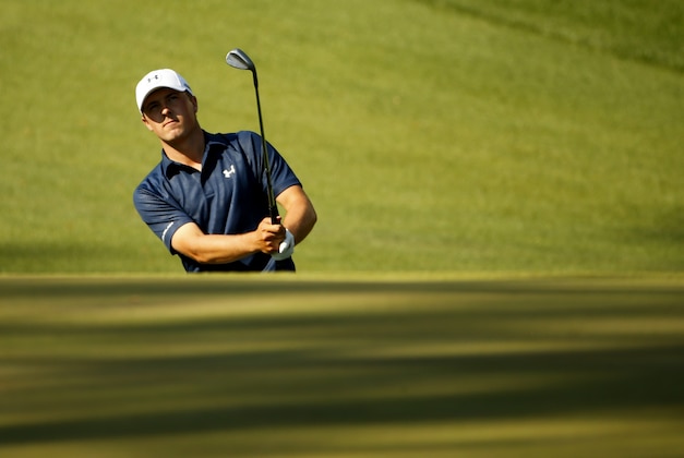 Apr 12, 2014; Augusta, GA, USA; Jordan Spieth chips onto the 10th green during the third round of the 2014 The Masters golf tournament at Augusta National Golf Club. Mandatory Credit: Jack Gruber-USA TODAY Sports