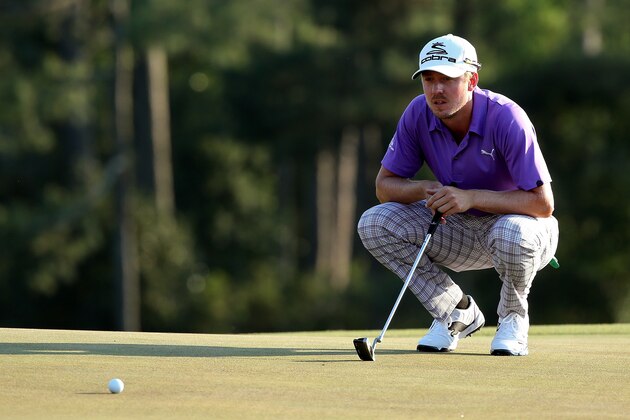 Kevin Streelman hits out of a bunker on the second hole during the third round of the Masters golf tournament Saturday, April 12, 2014, in Augusta, Ga. (AP Photo/Darron Cummings)