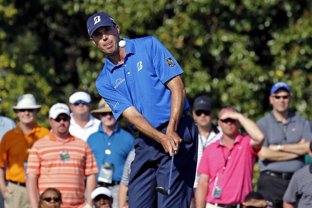 Matt Kuchar chips to the 17th green during the third round of the Masters golf tournament Saturday, April 12, 2014, in Augusta, Ga. (AP Photo/David J. Phillip)