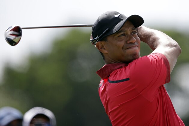 Tiger Woods hits from the third tee during the final round of the Cadillac Championship golf tournament on Sunday, March 9, 2014, in Doral, Fla. (AP Photo/Wilfredo Lee)