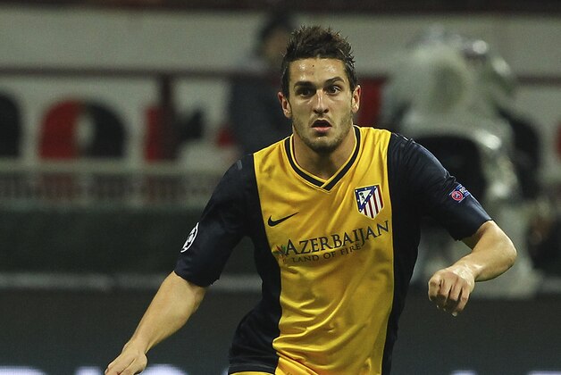 MILAN, ITALY - FEBRUARY 19:  Koke of Club Atletico de Madrid in action during the UEFA Champions League Round of 16 match between AC Milan and Club Atletico de Madrid at Stadio Giuseppe Meazza on February 19, 2014 in Milan, Italy.  (Photo by Marco Luzzani/Getty Images)