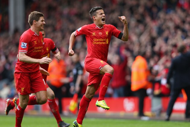 LIVERPOOL, ENGLAND - APRIL 13:  Philippe Coutinho of Liverpool celebrates scoring his team's third goal during the Barclays Premier League match between Liverpool and Manchester City at Anfield on April 13, 2014 in Liverpool, England.  (Photo by Alex Livesey/Getty Images)