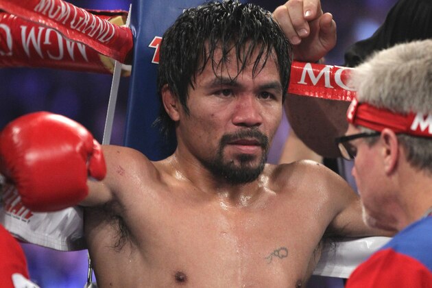 Manny Pacquiao, of the Philippines, sits in his corner between rounds of his WBO welterweight title boxing fight against Timothy Bradley Saturday, April 12, 2014, in Las Vegas. (AP Photo/Isaac Brekken) Manny Pacquiao, of the Philippines, sits in his corner between rounds of his WBO welterweight title boxing fight against Timothy Bradley Saturday, April 12, 2014, in Las Vegas. (AP Photo/Isaac Brekken)