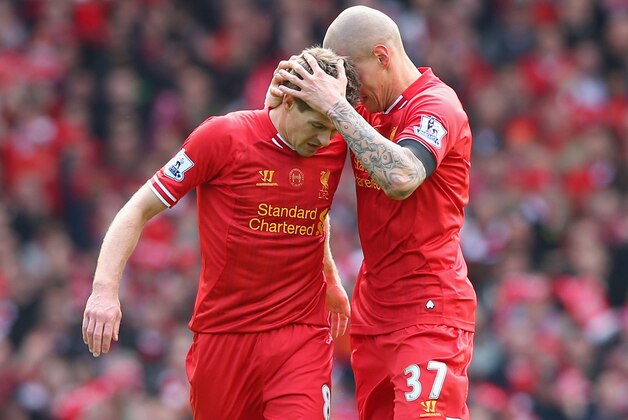 LIVERPOOL, ENGLAND - APRIL 13:  Martin Skrtel of Liverpool celebrates scoring the second goal with team-mate Steven Gerrard (L) during the Barclays Premier League match between Liverpool and Manchester City at Anfield on April 13, 2014 in Liverpool, England.  (Photo by Alex Livesey/Getty Images)