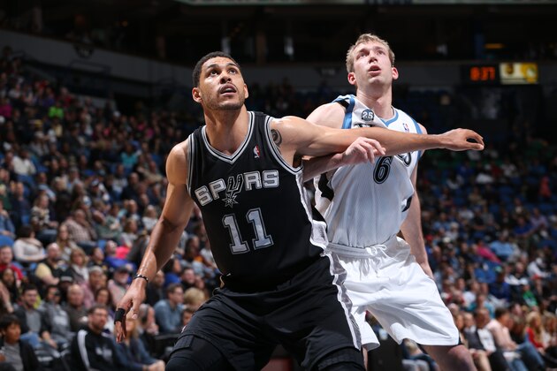 MINNEAPOLIS, MN - April 8: Jeff Ayres #11 of the San Antonio Spurs battles for rebound position against the Minnesota Timberwolves during the game on April 8, 2014 at Target Center in Minneapolis, Minnesota. NOTE TO USER: User expressly acknowledges and agrees that, by downloading and or using this Photograph, user is consenting to the terms and conditions of the Getty Images License Agreement. Mandatory Copyright Notice: Copyright 2014 NBAE (Photo by David Sherman/NBAE via Getty Images)