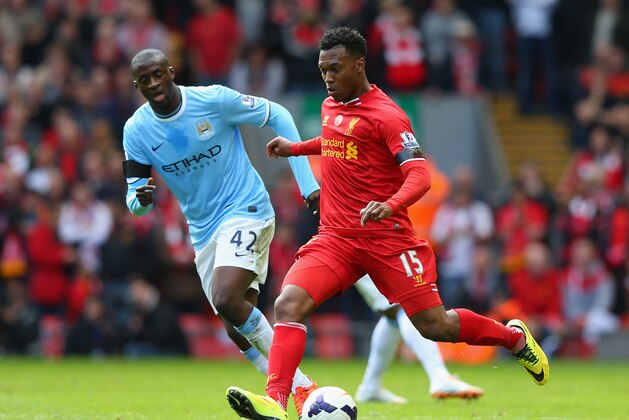 LIVERPOOL, ENGLAND - APRIL 13:  Yaya Toure of Manchester City competes with Daniel Sturridge of Liverpool during the Barclays Premier League match between Liverpool and Manchester City at Anfield on April 13, 2014 in Liverpool, England.  (Photo by Alex Livesey/Getty Images)