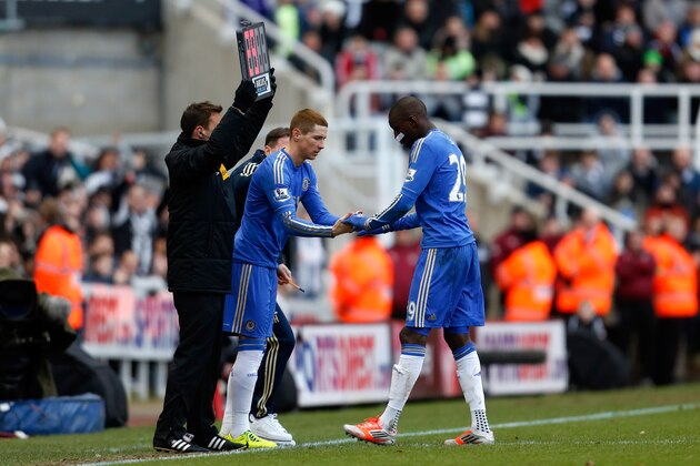 NEWCASTLE, ENGLAND - FEBRUARY 2: Demba Ba (R) of Chelsea comes off injured and is replaced by team mate Fernando Torres during the Premier League match between Newcastle United and Chelsea at St James Park on February 2, 2013 in Newcastle, England. (Photo by Paul Thomas/Getty Images)