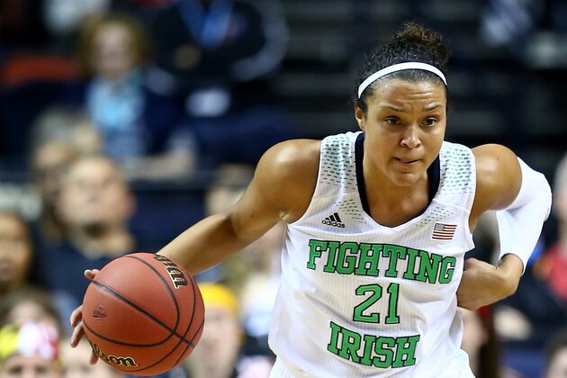 NASHVILLE, TN - APRIL 06:  Kayla McBride #21 of the Notre Dame Fighting Irish handles the ball in the second half against the Maryland Terrapins during the NCAA Women's Final Four semifinal at Bridgestone Arena on April 6, 2014 in Nashville, Tennessee.  (Photo by Andy Lyons/Getty Images)