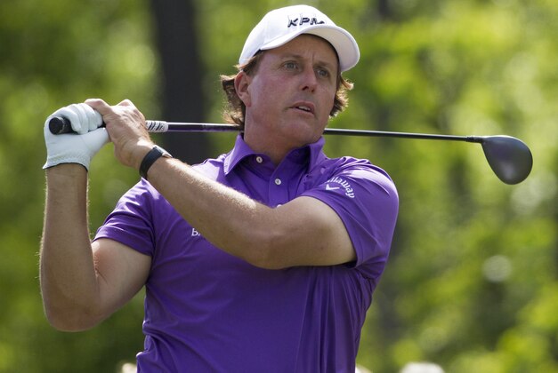 Phil Mickelson tees off on the 12th hole during the second round of the Houston Open golf tournament on Friday, April 4, 2014, in Humble, Texas. (AP Photo/Patric Schneider)