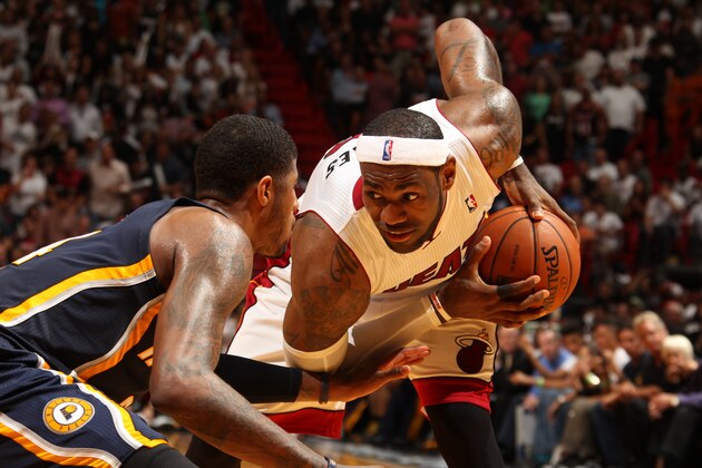 MIAMI, FL - April 11: LeBron James #6 of the Miami Heat handles the ball against the Indiana Pacers at the American Airlines Arena in Miami, Florida on April 11, 2014. NOTE TO USER: User expressly acknowledges and agrees that, by downloading and/or using this photograph, user is consenting to the terms and conditions of the Getty Images License Agreement. Mandatory copyright notice: Copyright NBAE 2014 (Photo by Issac Baldizon/NBAE via Getty Images) MIAMI, FL - April 11: LeBron James #6 of the Miami Heat handles the ball against the Indiana Pacers at the American Airlines Arena in Miami, Florida on April 11, 2014. NOTE TO USER: User expressly acknowledges and agrees that, by downloading and/or using this photograph, user is consenting to the terms and conditions of the Getty Images License Agreement. Mandatory copyright notice: Copyright NBAE 2014 (Photo by Issac Baldizon/NBAE via Getty Images)