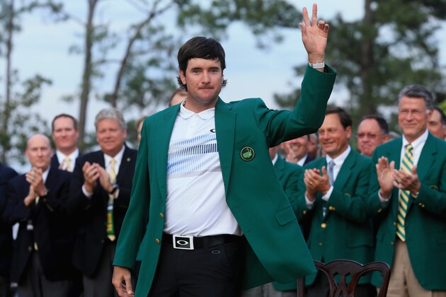 AUGUSTA, GA - APRIL 13:  Bubba Watson of the United States poses with the green jacket after winning the 2014 Masters Tournament by a three-stroke margin at Augusta National Golf Club on April 13, 2014 in Augusta, Georgia.  (Photo by David Cannon/Getty Images)