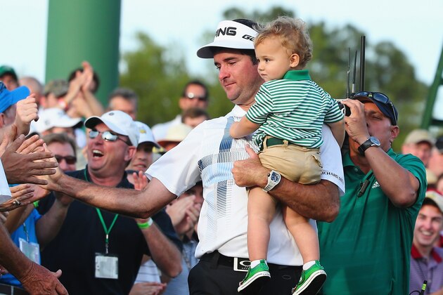 AUGUSTA, GA - APRIL 13:  Bubba Watson of the United States holds his son Caleb on the 18th green after winning the 2014 Masters Tournament by a three-stroke margin at Augusta National Golf Club on April 13, 2014 in Augusta, Georgia. during the final round of the 2014 Masters Tournament at Augusta National Golf Club on April 13, 2014 in Augusta, Georgia.  (Photo by Andrew Redington/Getty Images)