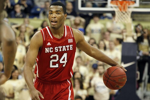 Mar 3, 2014; Pittsburgh, PA, USA; North Carolina State Wolfpack forward T.J. Warren (24) handles the ball against the Pittsburgh Panthers during the second half at the Petersen Events Center. The North Carolina State Wolfpack won 74-67. Mandatory Credit: Charles LeClaire-USA TODAY Sports