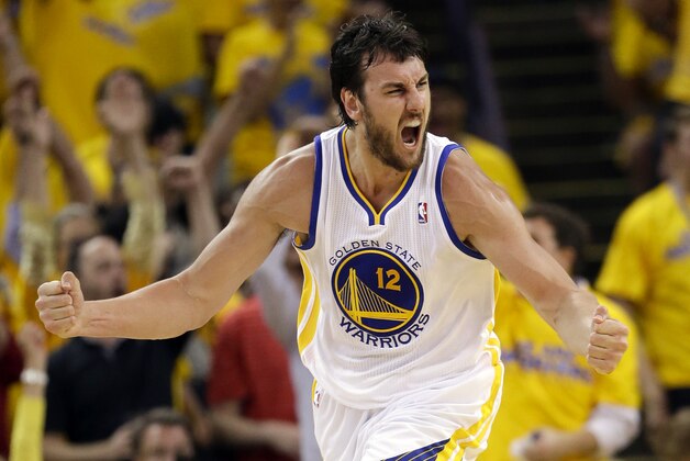 FILE - In this May 2, 2013 file photo, Golden State Warriors' Andrew Bogut celebrates scoring against the Denver Nuggets during an NBA basketball game in Oakland, Calif. Bogut says he is FILE - In this May 2, 2013 file photo, Golden State Warriors' Andrew Bogut celebrates scoring against the Denver Nuggets during an NBA basketball game in Oakland, Calif. Bogut says he is