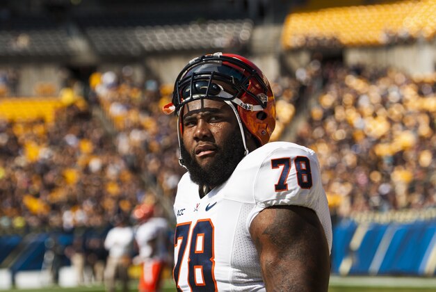 Sep 28, 2013; Pittsburgh, PA, USA; Virginia Cavaliers offensive tackle Morgan Moses (78) prior to playing the Pittsburgh Panthers at Heinz Field. Pittsburgh defeated Virginia 14-3. Mandatory Credit: Howard Smith-USA TODAY Sports