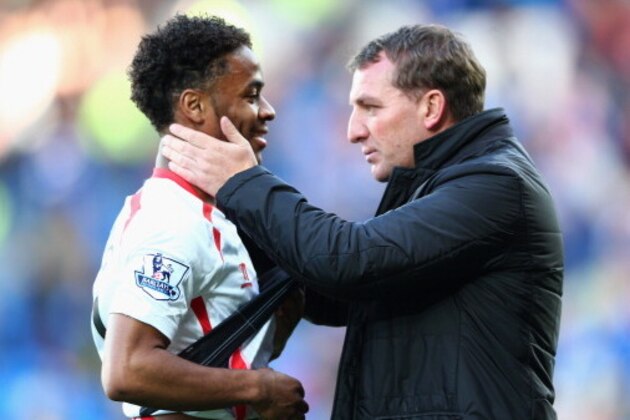 CARDIFF, WALES - MARCH 22:  Brendan Rodgers (R) the manager of Liverpool chats with Raheem Sterling after his side's 6-3 victory during the Barclays Premier League match between Cardiff City and Liverpool at the Cardiff City Stadium on March 22, 2014 in Cardiff, Wales.  (Photo by Michael Steele/Getty Images)