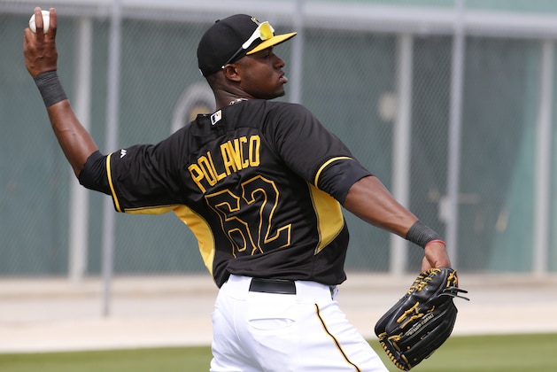 Pittsburgh Pirates' Gregory Polanco warms up during the team's baseball spring training workout in Bradenton, Fla., Friday, Feb. 21, 2014. (AP Photo/Gene J. Puskar)