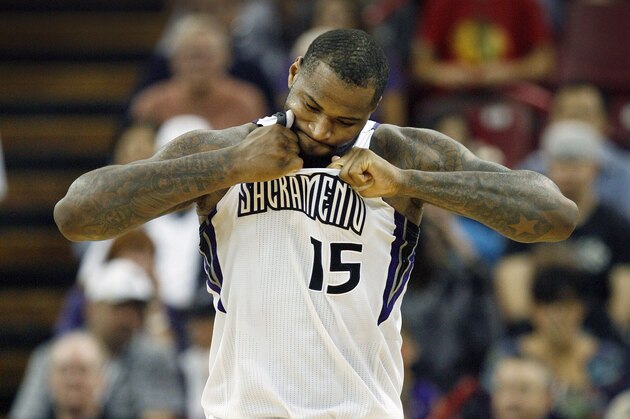 Sacramento Kings center DeMarcus Cousins tears at his jersey after drawing a technical foul against the Minnesota Timberwolves during the second half of an NBA basketball game in Sacramento, Calif., on Sunday, April 13, 2014. The Kings won 106-103.(AP Photo/Steve Yeater)