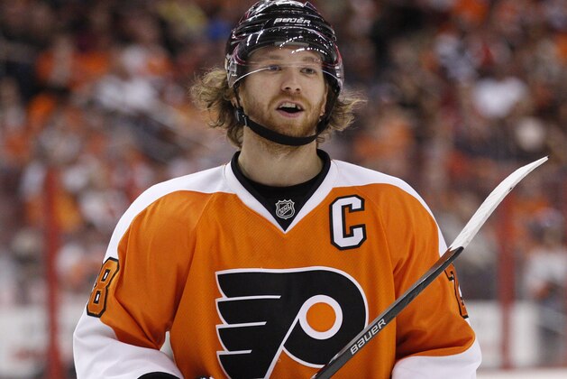 Philadelphia Flyers' Claude Giroux looks on during the second period of an NHL hockey game against the Carolina Hurricanes, Sunday, April 13, 2014, in Philadelphia. The Hurricanes won 6-5 in a shootout. (AP Photo/Chris Szagola)