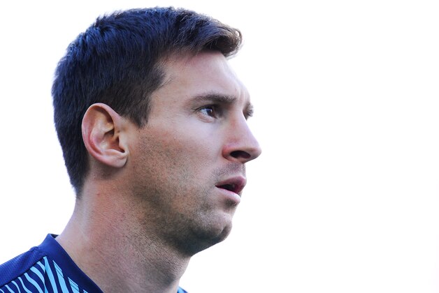 BARCELONA, SPAIN - APRIL 05:  Lionel Messi of FC Barcelona looks on  during warm up prior to the La Liga match between FC Barcelona and Real Betis Balompie at Camp Nou on April 5, 2014 in Barcelona, Spain.  (Photo by David Ramos/Getty Images)