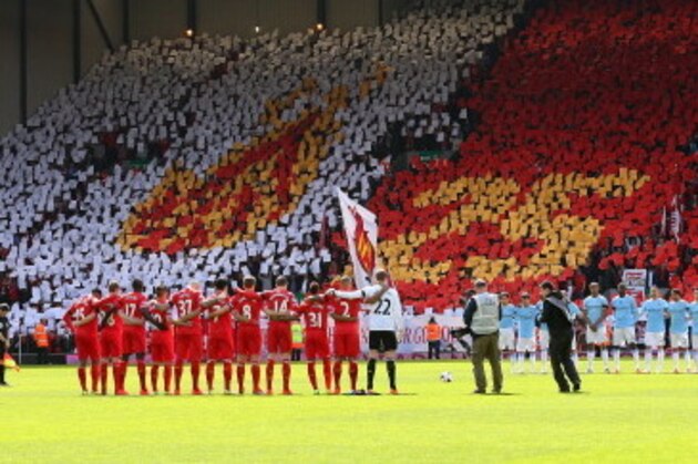 LIVERPOOL, ENGLAND - APRIL 13:  The Liverpool and Manchester City players acknowledge a minutes silence for the Hillsborough victims on the 25th anniversary of the tragedy prior to the Barclays Premier League match between Liverpool and Manchester City at Anfield on April 13, 2014 in Liverpool, England.  (Photo by Alex Livesey/Getty Images)