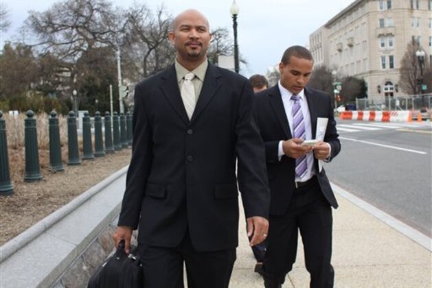 CORRECTS THE SPELLING OF FIRST NAME TO KAIN, NOT CAIN - Former Northwestern University football quarterback Kain Colter, right, and Ramogi Huma, founder and president of the National College Players Association arrive on Capitol Hill in Washington Wednesday, April, 2, 2014. Members of a group seeking to unionize college athletes are looking for allies on Capitol Hill as they brace for an appeal of a ruling that said full scholarship athletes at Northwestern University are employees who have the right to form a union. Former Northwestern quarterback Kain Colter _ the face of a movement to give college athletes the right to unionize _ and Ramogi Huma, the founder and president of the National College Players Association, scheduled meetings Wednesday with lawmakers. (AP Photo/Lauren Victoria Burke) CORRECTS THE SPELLING OF FIRST NAME TO KAIN, NOT CAIN - Former Northwestern University football quarterback Kain Colter, right, and Ramogi Huma, founder and president of the National College Players Association arrive on Capitol Hill in Washington Wednesday, April, 2, 2014. Members of a group seeking to unionize college athletes are looking for allies on Capitol Hill as they brace for an appeal of a ruling that said full scholarship athletes at Northwestern University are employees who have the right to form a union. Former Northwestern quarterback Kain Colter _ the face of a movement to give college athletes the right to unionize _ and Ramogi Huma, the founder and president of the National College Players Association, scheduled meetings Wednesday with lawmakers. (AP Photo/Lauren Victoria Burke)