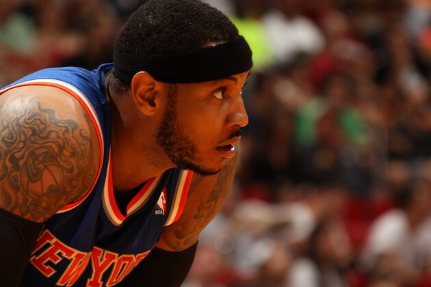 MIAMI, FL - April 6: Carmelo Anthony #7 of the New York Knicks looks on while on the court during the game against the Miami Heat at the American Airlines Arena in Miami, Florida on April 6, 2014. NOTE TO USER: User expressly acknowledges and agrees that, by downloading and/or using this photograph, user is consenting to the terms and conditions of the Getty Images License Agreement. Mandatory copyright notice: Copyright NBAE 2014 (Photo by Issac Baldizon/NBAE via Getty Images) MIAMI, FL - April 6: Carmelo Anthony #7 of the New York Knicks looks on while on the court during the game against the Miami Heat at the American Airlines Arena in Miami, Florida on April 6, 2014. NOTE TO USER: User expressly acknowledges and agrees that, by downloading and/or using this photograph, user is consenting to the terms and conditions of the Getty Images License Agreement. Mandatory copyright notice: Copyright NBAE 2014 (Photo by Issac Baldizon/NBAE via Getty Images)