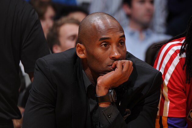 LOS ANGELES, CA - JANUARY 3:  Kobe Bryant #24 of the Los Angeles Lakers watching the game against the Utah Jazz at STAPLES Center on January 3, 2013 in Los Angeles, California. NOTE TO USER: User expressly acknowledges and agrees that, by downloading and/or using this Photograph, user is consenting to the terms and conditions of the Getty Images License Agreement. Mandatory Copyright Notice: Copyright 2013 NBAE (Photo by Andrew D. Bernstein/NBAE via Getty Images)