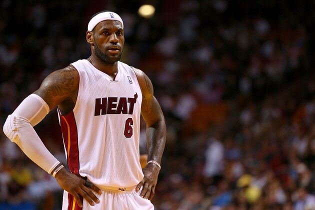 MIAMI, FL - APRIL 08:  LeBron James #6 of the Miami Heat looks on during a game against the Brooklyn Nets at AmericanAirlines Arena on April 8, 2014 in Miami, Florida. NOTE TO USER: User expressly acknowledges and agrees that, by downloading and/or using this photograph, user is consenting to the terms and conditions of the Getty Images License Agreement. Mandatory copyright notice:  (Photo by Mike Ehrmann/Getty Images)