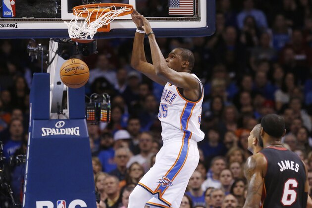 Oklahoma City Thunder forward Kevin Durant dunks in front of Miami Heat forward LeBron James (6) during the first quarter of an NBA basketball game in Oklahoma City, Thursday, Feb. 20, 2014. (AP Photo/Sue Ogrocki) Oklahoma City Thunder forward Kevin Durant dunks in front of Miami Heat forward LeBron James (6) during the first quarter of an NBA basketball game in Oklahoma City, Thursday, Feb. 20, 2014. (AP Photo/Sue Ogrocki)
