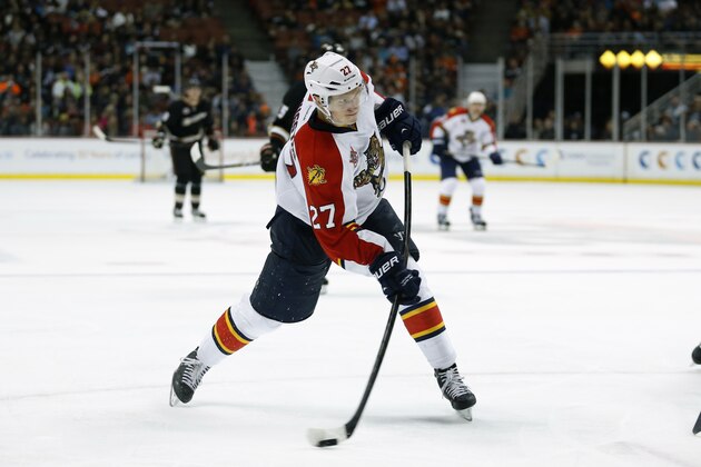 Florida Panthers center Nick Bjugstad shoots the puck against the Anaheim Ducks during the third period of an NHL hockey game, Sunday, March 23, 2014 in Anaheim, Calif. The Ducks won 6-2. (AP Photo/Danny Moloshok)