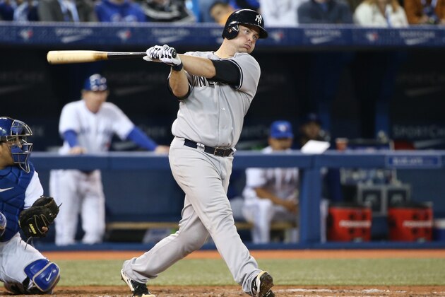 TORONTO, CANADA - APRIL 4: Brian McCann #34 of the New York Yankees bats in the fourth inning during MLB game action against the Toronto Blue Jays on April 4, 2014 at Rogers Centre in Toronto, Ontario, Canada. (Photo by Tom Szczerbowski/Getty Images)