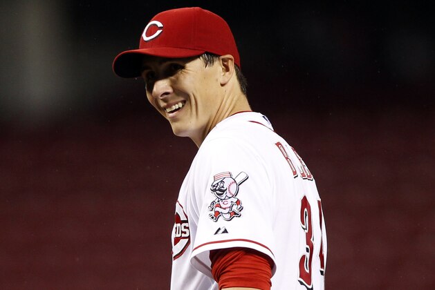 Apr 14, 2014; Cincinnati, OH, USA; Cincinnati Reds starting pitcher Homer Bailey (34) reacts to a call during the first inning against the Pittsburgh Pirates at Great American Ball Park. Mandatory Credit: Frank Victores-USA TODAY Sports