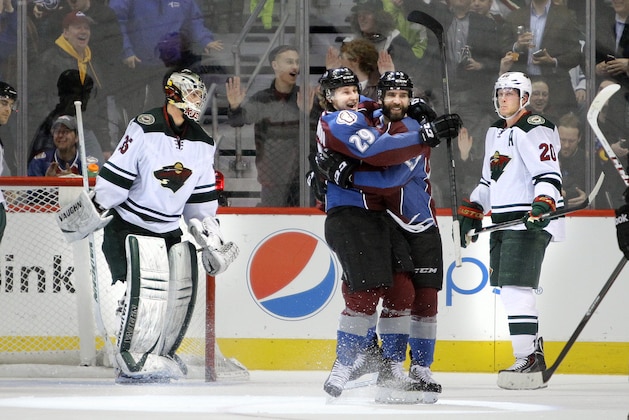 Colorado Avalanche's Nathan MacKinnon (29) hugs Maxime Talbot after he scored during the second period of an NHL hockey game Thursday, Jan. 30, 2014, in Denver. Minnesota Wild goalie Darcy Kuemper, left, and Wild's Ryan Suter, right, react in the background. (AP Photo/Barry Gutierrez) Colorado Avalanche's Nathan MacKinnon (29) hugs Maxime Talbot after he scored during the second period of an NHL hockey game Thursday, Jan. 30, 2014, in Denver. Minnesota Wild goalie Darcy Kuemper, left, and Wild's Ryan Suter, right, react in the background. (AP Photo/Barry Gutierrez)