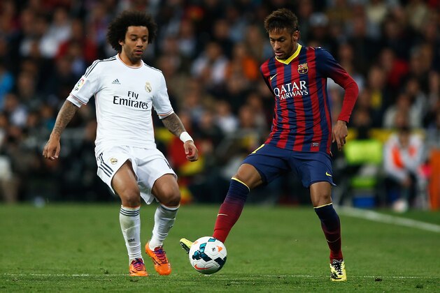 MADRID, SPAIN - MARCH 23: Neymar of Barcelona is closed down by Marcelo of Real Madrid during the La Liga match between Real Madrid CF and FC Barcelona at the Bernabeu on March 23, 2014 in Madrid, Spain. (Photo by Gonzalo Arroyo Moreno/Getty Images) MADRID, SPAIN - MARCH 23: Neymar of Barcelona is closed down by Marcelo of Real Madrid during the La Liga match between Real Madrid CF and FC Barcelona at the Bernabeu on March 23, 2014 in Madrid, Spain. (Photo by Gonzalo Arroyo Moreno/Getty Images)