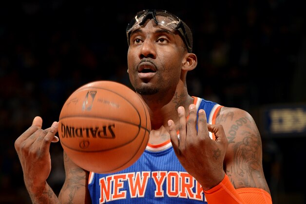 TORONTO, CANADA - April 11 :Amar'e Stoudemire #1 of the New York Knicks attempts a free throw against the Toronto Raptors on April 11, 2014 at the Air Canada Centre in Toronto, Ontario, Canada.  NOTE TO USER: User expressly acknowledges and agrees that, by downloading and or using this Photograph, user is consenting to the terms and conditions of the Getty Images License Agreement.  Mandatory Copyright Notice: Copyright 2014 NBAE (Photo by Ron Turenne/NBAE via Getty Images)