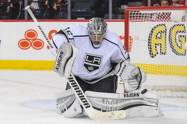 CALGARY, AB - APRIL 9: Jonathan Quick #32 of the Los Angeles Kings stops a shot from the Calgary Flames during an NHL game at Scotiabank Saddledome on April 9, 2014 in Calgary, Alberta, Canada. The Flames defeated the Kings 4-3 in shootout. (Photo by Derek Leung/Getty Images) CALGARY, AB - APRIL 9: Jonathan Quick #32 of the Los Angeles Kings stops a shot from the Calgary Flames during an NHL game at Scotiabank Saddledome on April 9, 2014 in Calgary, Alberta, Canada. The Flames defeated the Kings 4-3 in shootout. (Photo by Derek Leung/Getty Images)