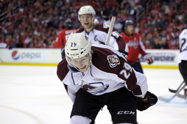 Colorado Avalanche center Nathan MacKinnon (29) celebrates his goal during the second period an NHL hockey game against the Washington Capitals, Saturday, Oct. 12, 2013, in Washington. (AP Photo/Nick Wass)