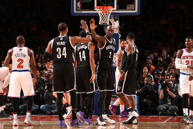 NEW YORK, NY - JANUARY 20: Paul Pierce #34 of the Brooklyn Nets high-fives teammate Kevin Garnett #2 during a game against the New York Knicks at Madison Square Garden in New York City on January 20, 2014.  NOTE TO USER: User expressly acknowledges and agrees that, by downloading and or using this photograph, User is consenting to the terms and conditions of the Getty Images License Agreement. Mandatory Copyright Notice: Copyright 2014 NBAE  (Photo by Nathaniel S. Butler/NBAE via Getty Images)