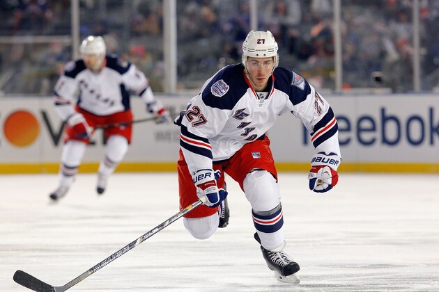 NEW YORK, NY - JANUARY 29:  (EDITORIAL USE ONLY)  Ryan McDonagh #27 of the New York Rangers in action against the New York Islanders during the 2014 Coors Light NHL Stadium Series at Yankee Stadium on January 29, 2014 in the Bronx borough of New York City. The Rangers defeated the Islanders 2-1.  (Photo by Jim McIsaac/NHLI via Getty Images)