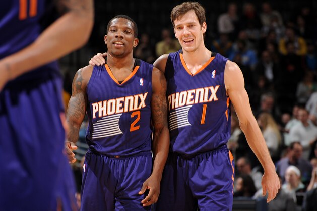 DENVER, CO - December 20: Eric Bledsoe #2 and Goran Dragic #1 of the Phoenix Suns smile and walk off the court against the Denver Nuggets on December 20, 2013 at the Pepsi Center in Denver, Colorado. NOTE TO USER: User expressly acknowledges and agrees that, by downloading and/or using this Photograph, user is consenting to the terms and conditions of the Getty Images License Agreement. Mandatory Copyright Notice: Copyright 2013 NBAE (Photo by Bart Young/NBAE via Getty Images) DENVER, CO - December 20: Eric Bledsoe #2 and Goran Dragic #1 of the Phoenix Suns smile and walk off the court against the Denver Nuggets on December 20, 2013 at the Pepsi Center in Denver, Colorado. NOTE TO USER: User expressly acknowledges and agrees that, by downloading and/or using this Photograph, user is consenting to the terms and conditions of the Getty Images License Agreement. Mandatory Copyright Notice: Copyright 2013 NBAE (Photo by Bart Young/NBAE via Getty Images)