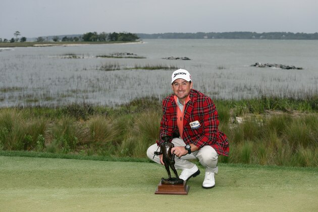 HILTON HEAD ISLAND, SC - APRIL 21:  Graeme McDowell of Northern Ireland poses with the trophy after defeating Webb Simpson in a playoff during the final round of the RBC Heritage at Harbour Town Golf Links on April 21, 2013 in Hilton Head Island, South Carolina.  (Photo by Streeter Lecka/Getty Images)