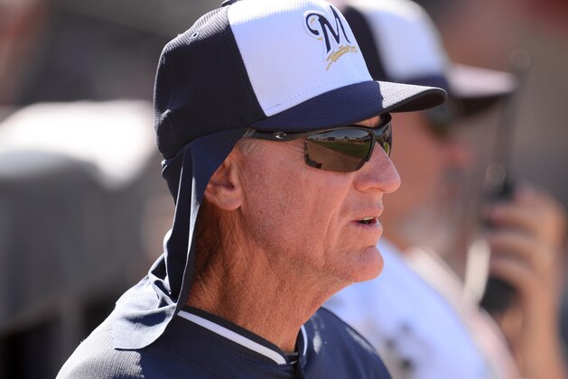 Mar 19, 2014; Peoria, AZ, USA; Milwaukee Brewers manager Ron Roenicke (10) looks on against the Seattle Mariners at Peoria Sports Complex. The Brewers won 9-7. Mandatory Credit: Joe Camporeale-USA TODAY Sports Mar 19, 2014; Peoria, AZ, USA; Milwaukee Brewers manager Ron Roenicke (10) looks on against the Seattle Mariners at Peoria Sports Complex. The Brewers won 9-7. Mandatory Credit: Joe Camporeale-USA TODAY Sports