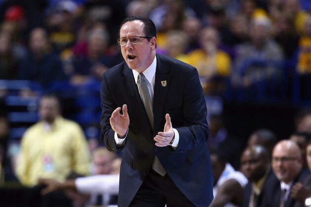ST LOUIS, MO - MARCH 23:  Head coach Gregg Marshall of the Wichita State Shockers gives instructions to his team against the Kentucky Wildcats during the third round of the 2014 NCAA Men's Basketball Tournament at Scottrade Center on March 23, 2014 in St Louis, Missouri.  (Photo by Andy Lyons/Getty Images)