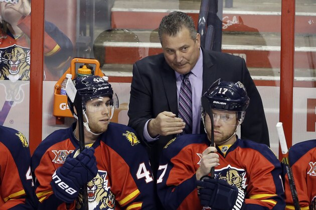 Florida Panthers interim head coach Peter Horachek, center, talks with center Quinton Howden (42) and center Jesse Winchester (17) in the second period of a hockey game against the Columbus Blue Jackets, Saturday, April 12, 2014, in Sunrise, Fla. (AP Photo/Lynne Sladky) Florida Panthers interim head coach Peter Horachek, center, talks with center Quinton Howden (42) and center Jesse Winchester (17) in the second period of a hockey game against the Columbus Blue Jackets, Saturday, April 12, 2014, in Sunrise, Fla. (AP Photo/Lynne Sladky)