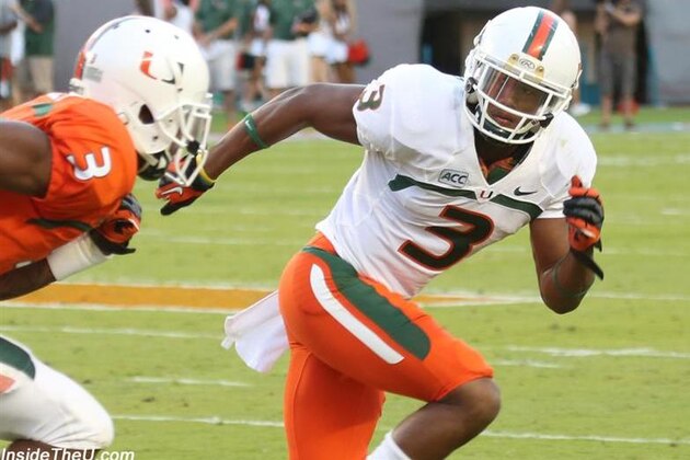 Miami's Phillip Dorsett (4) runs against North Carolina during the first half of an NCAA college football game in Chapel Hill, N.C., Thursday, Oct. 17, 2013. (AP Photo/Gerry Broome)