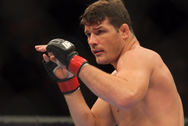 Apr 27, 2013; Newark, NJ, USA; Michael Bisping (red gloves) competes against Alan Belcher (not pictured) during UFC 159 at the Prudential Center. Mandatory Credit: Brad Penner-USA TODAY Sports